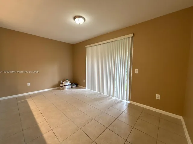 a view of a livingroom with a staircase