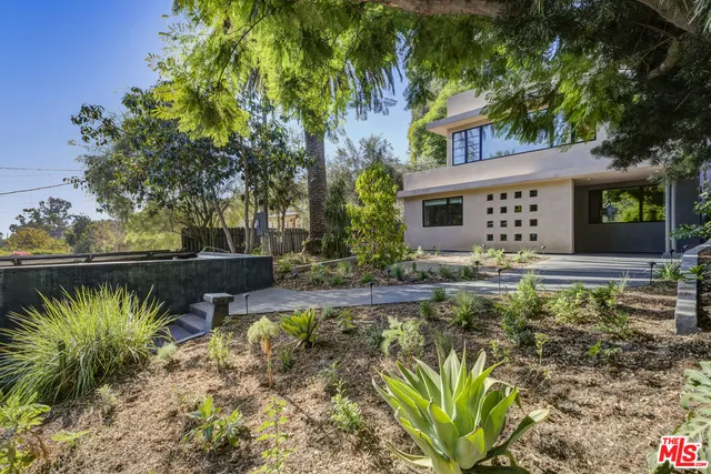 a house view with a outdoor space