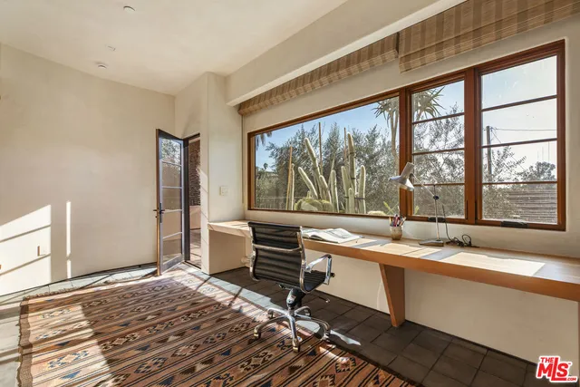 a kitchen with stainless steel appliances granite countertop a stove a refrigerator and a refrigerator