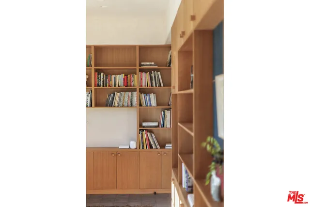 a kitchen with a stove a sink and a refrigerator