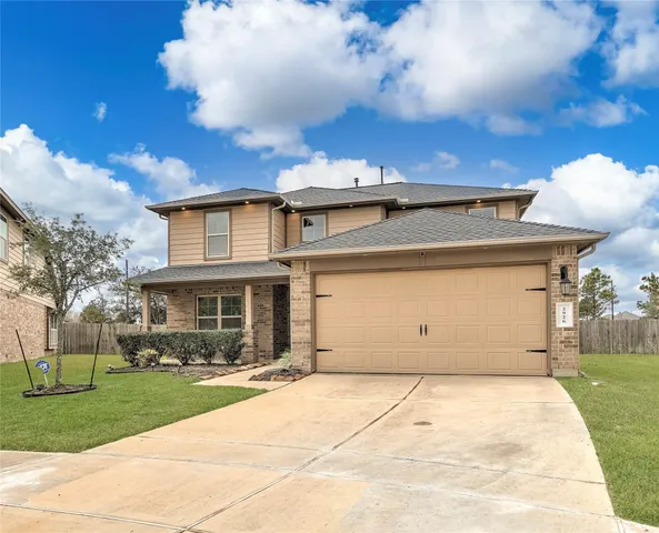 a front view of house with yard