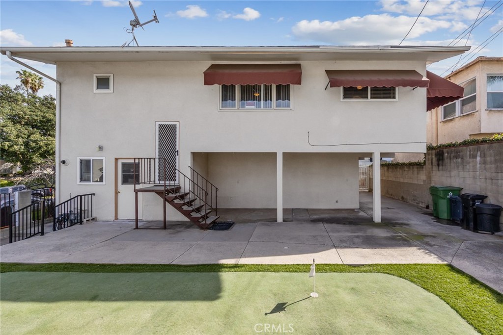 101 Hampden Terrace Alhambra, CA 91801 - Photo 5 of 46 a view of a house with a yard and sitting area
