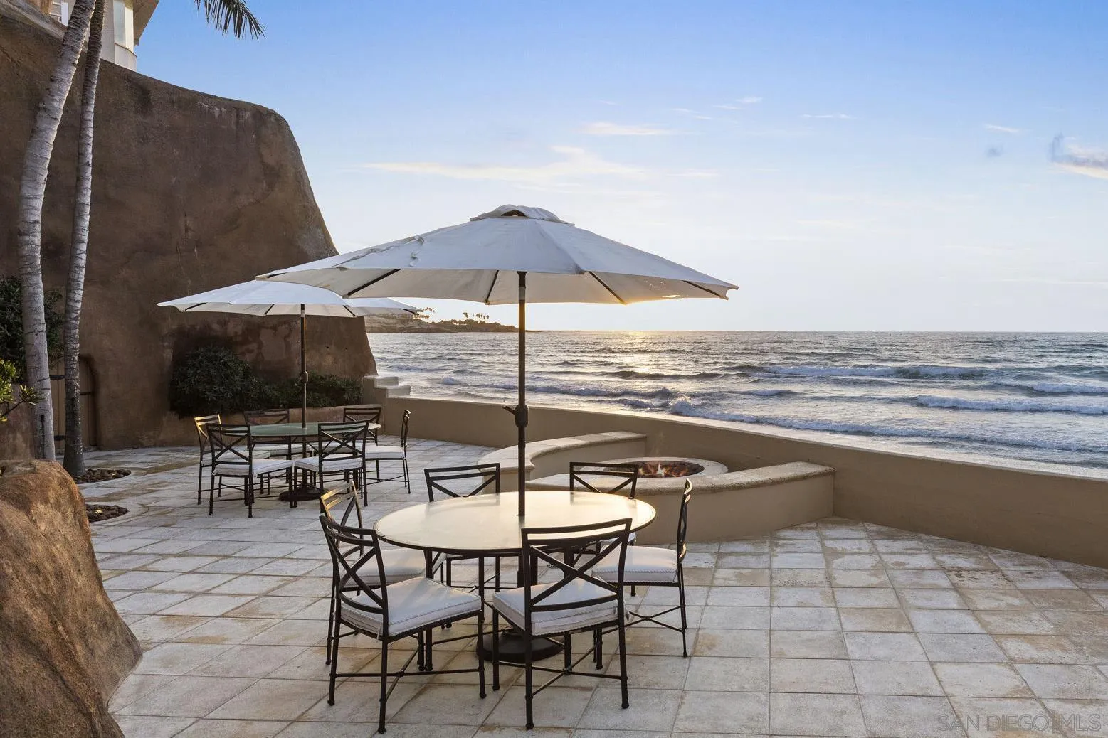 1900 Spindrift Drive La Jolla, CA 92037 - Photo 13 of 50 a view of a terrace with furniture and umbrella