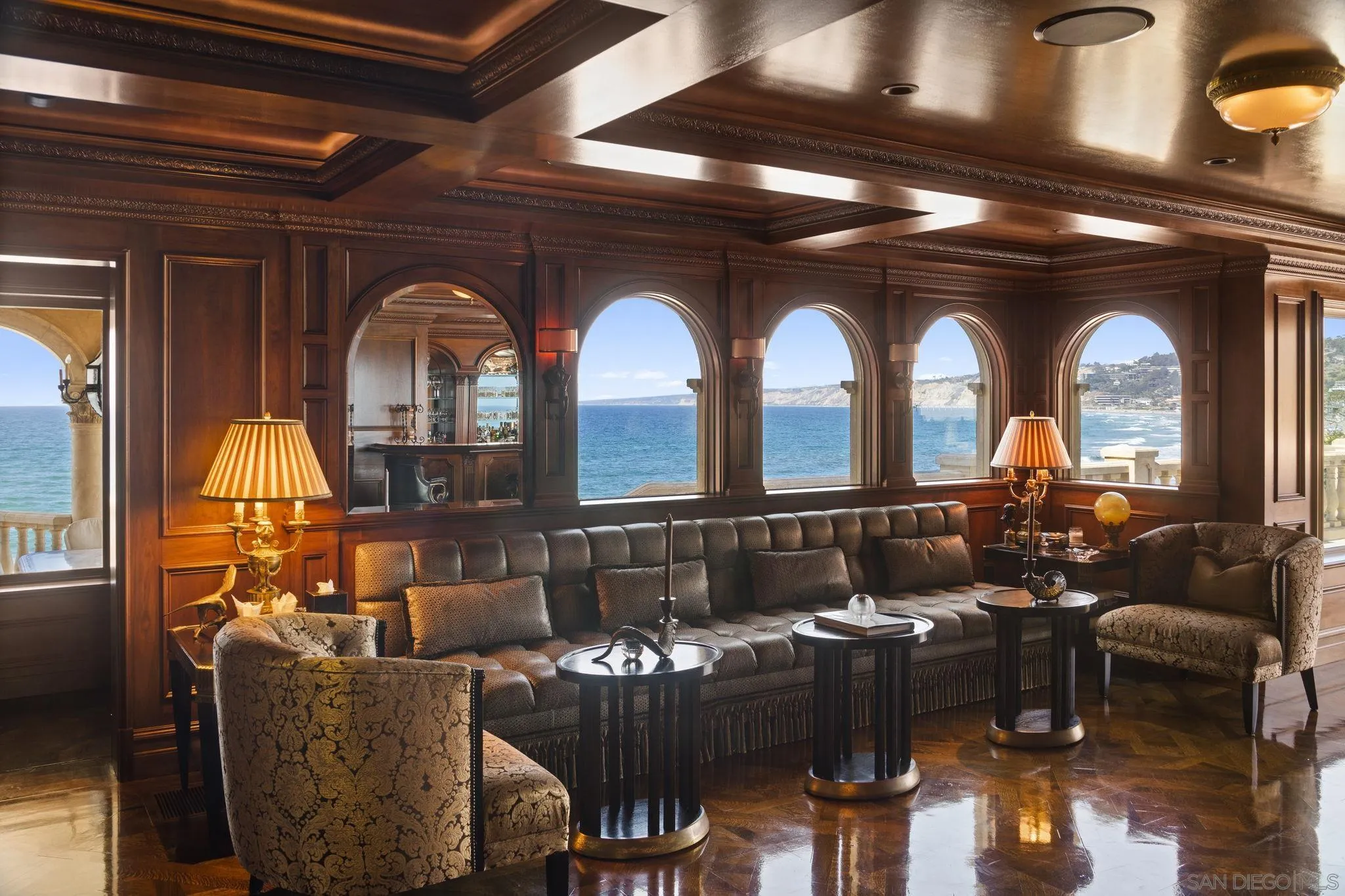 1900 Spindrift Drive La Jolla, CA 92037 - Photo 16 of 50 a living room with furniture and wooden floor