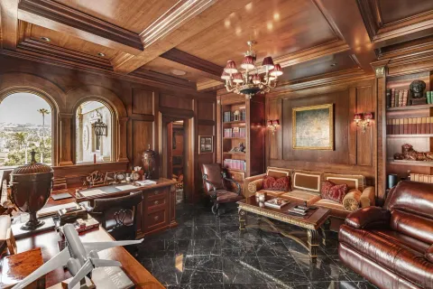 a view of a white building with a outdoor space