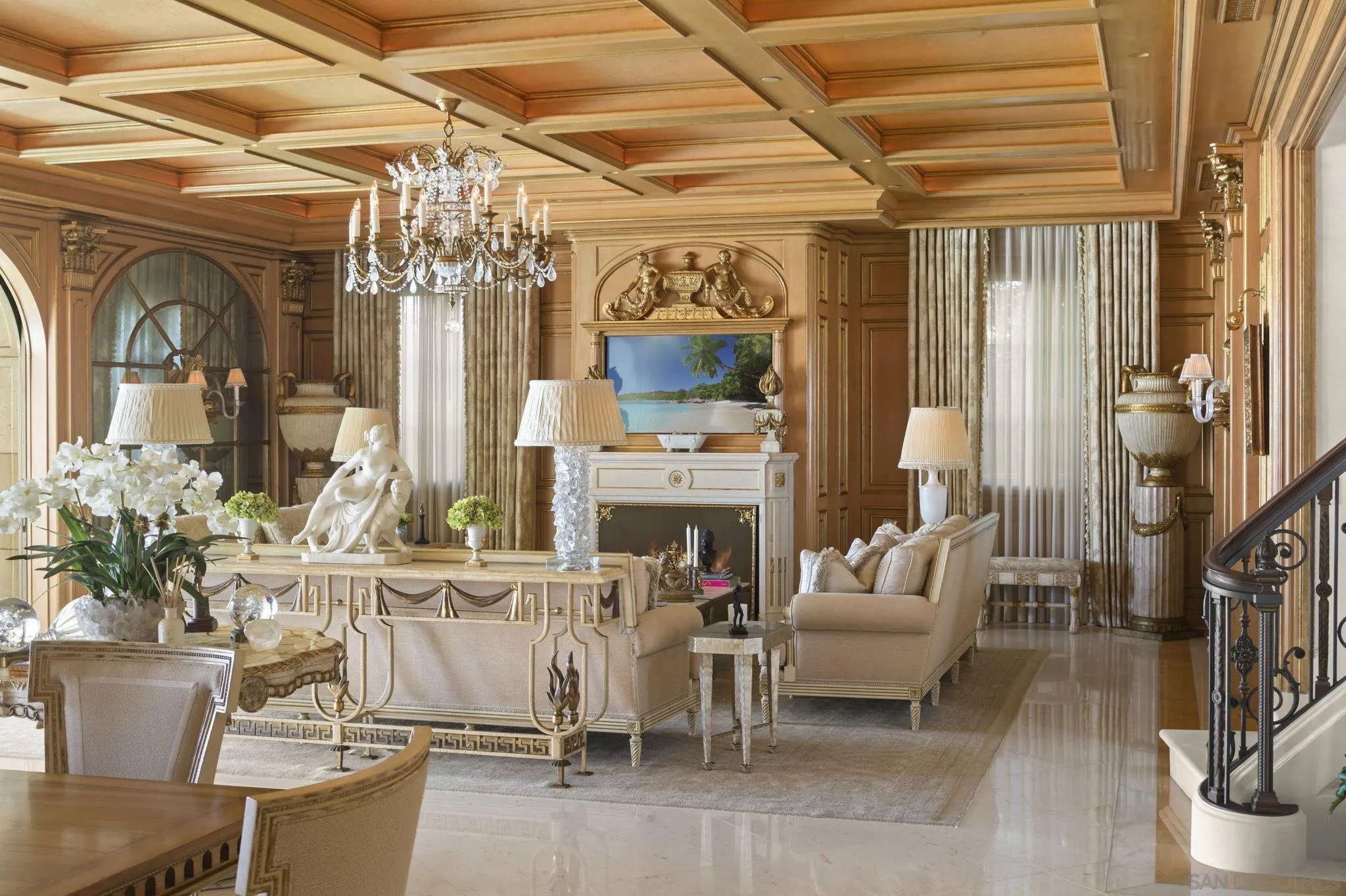 1900 Spindrift Drive La Jolla, CA 92037 - Photo 38 of 50 a living room with fireplace furniture and a chandelier