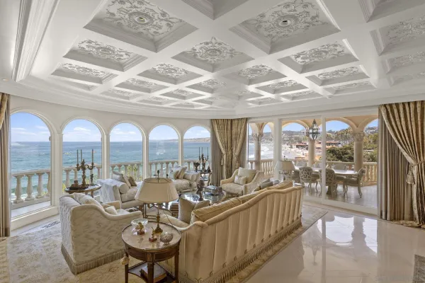 a view of a dining room with furniture wooden floor and chandelier
