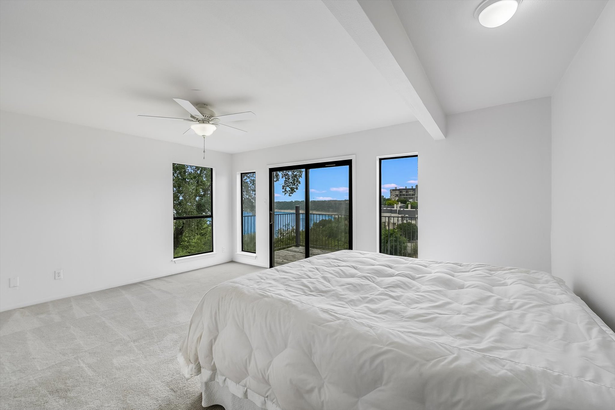 2918 Ranch Road 620 North, Unit B112 Austin, TX 78734 - Photo 7 of 10 Master Bedroom with lake and kill country views