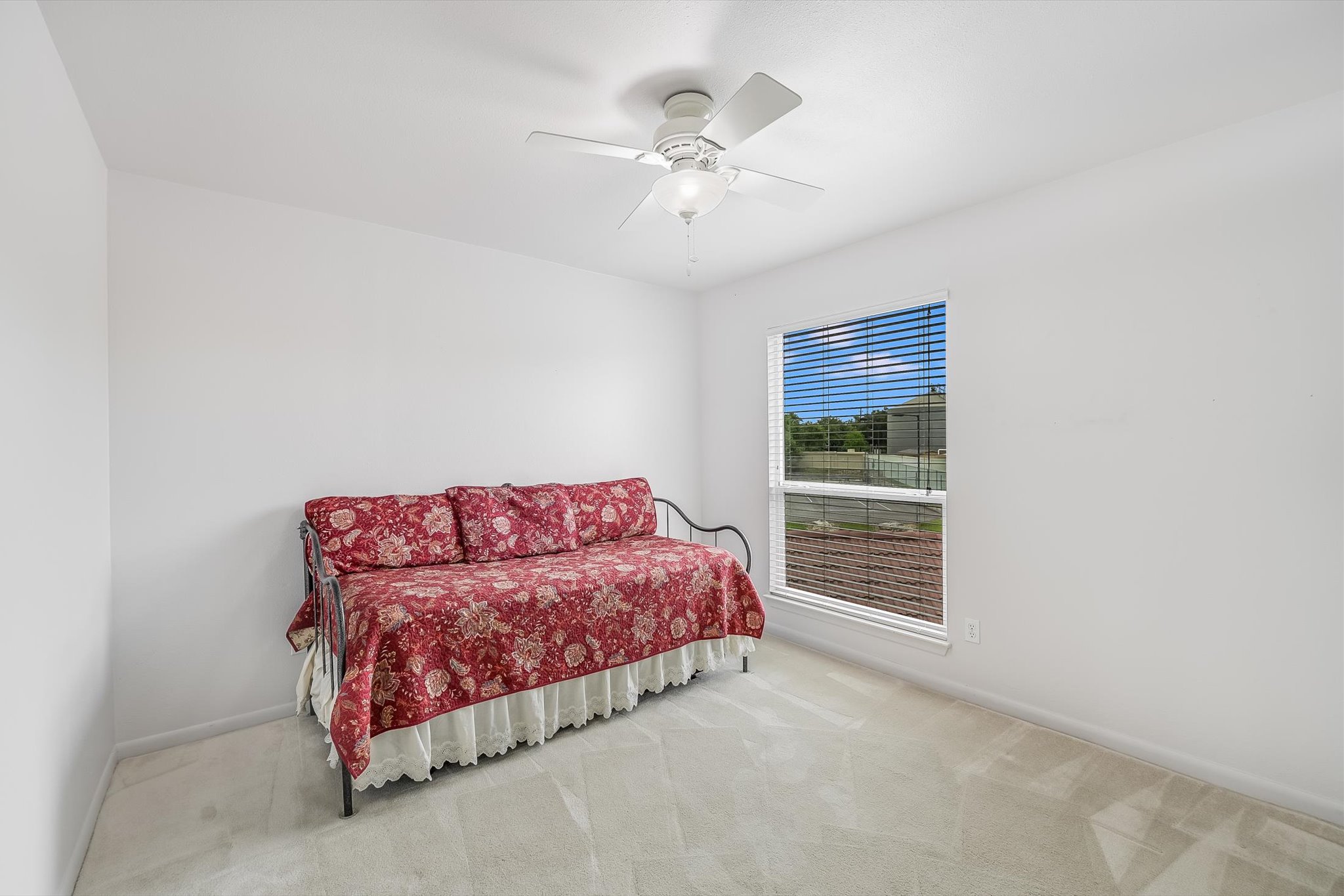 2918 Ranch Road 620 North, Unit B112 Austin, TX 78734 - Photo 9 of 10 Carpeted bedroom featuring baseboards and a ceiling fan