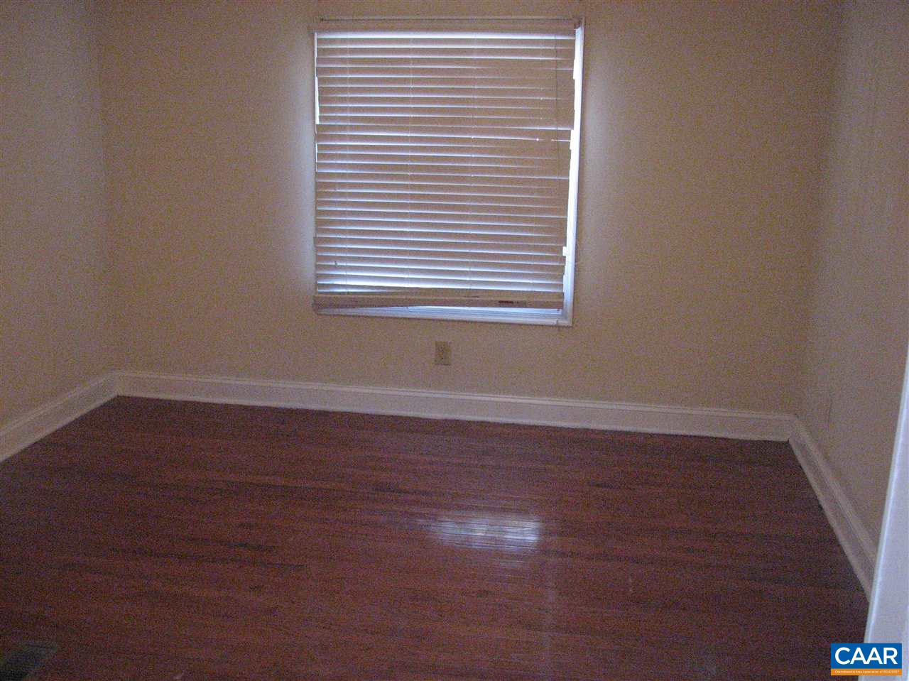 4247 Rising Sun Road Palmyra, VA 22963 - Photo 11 of 31 a view of a room that has wooden floor and a window