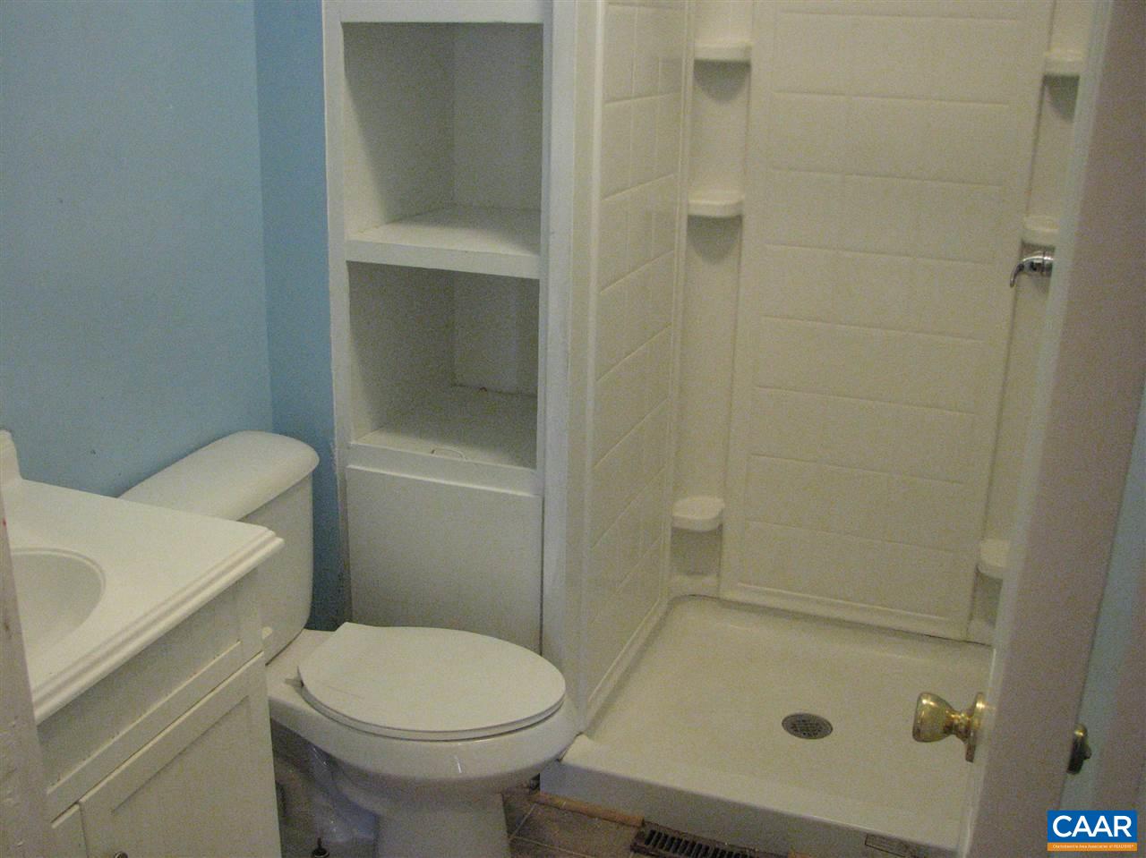 4247 Rising Sun Road Palmyra, VA 22963 - Photo 16 of 31 a bathroom with a sink and a toilet