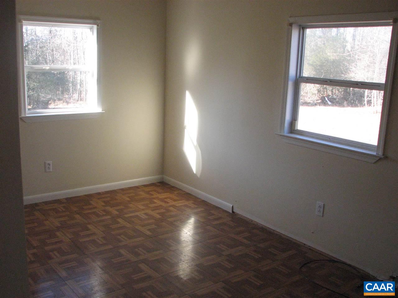 4247 Rising Sun Road Palmyra, VA 22963 - Photo 20 of 31 an empty room with wooden floor and windows