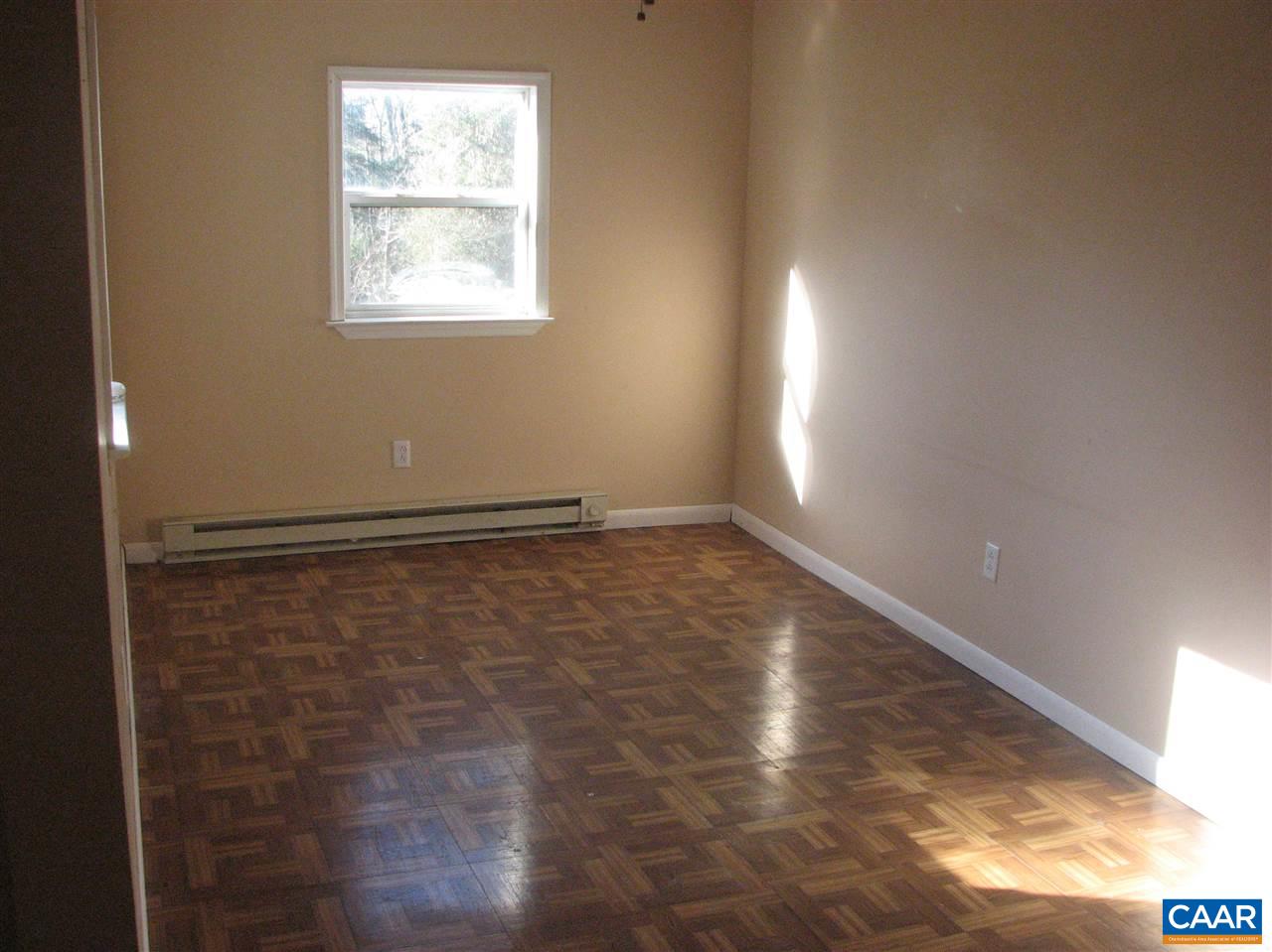 4247 Rising Sun Road Palmyra, VA 22963 - Photo 23 of 31 a view of an empty room with wooden floor and a window