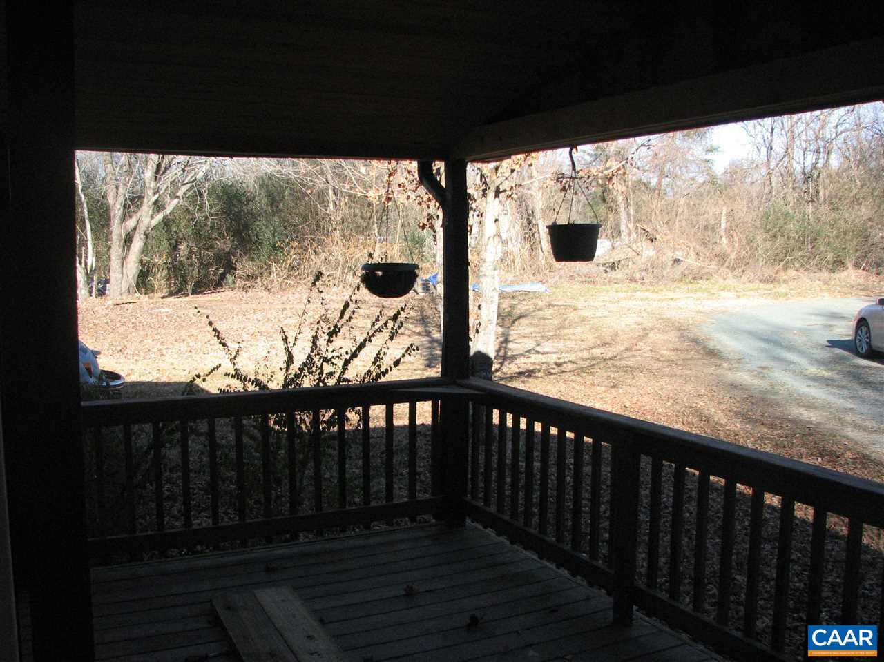 4247 Rising Sun Road Palmyra, VA 22963 - Photo 25 of 31 a view of a balcony with wooden floor and a floor to ceiling window