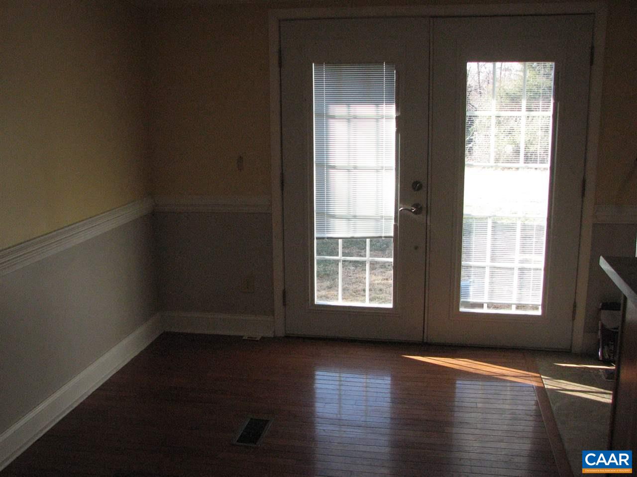 4247 Rising Sun Road Palmyra, VA 22963 - Photo 5 of 31 an empty room with wooden floor and windows