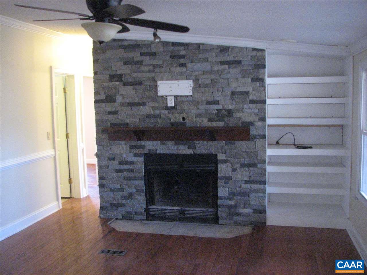 4247 Rising Sun Road Palmyra, VA 22963 - Photo 9 of 31 a room with a fireplace