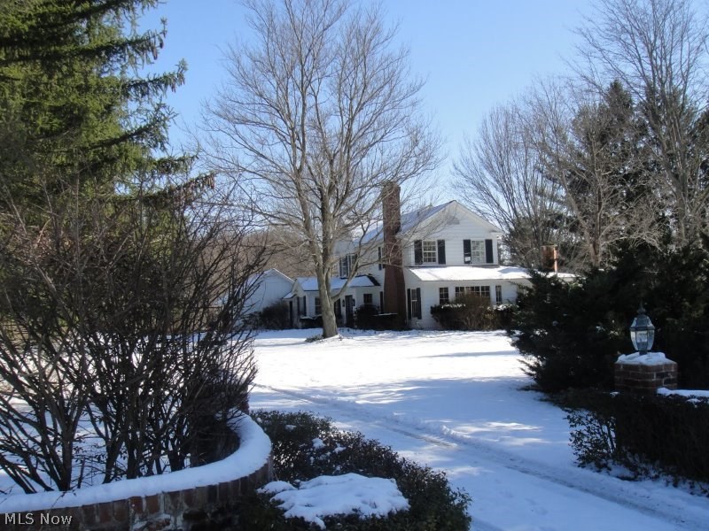7537 Huntington Road Hudson, OH 44236 - Photo 10 of 10 Nestled upon a mature, natural setting, this 4 bedroom treasure boasts a spacious & flexible floorplan with quality craftsmanship spanning from the inside out!