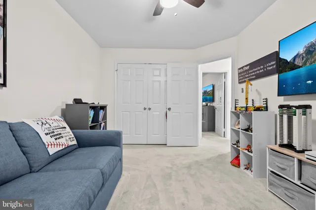 a bathroom with a sink vanity granite toilet shower and bathtub
