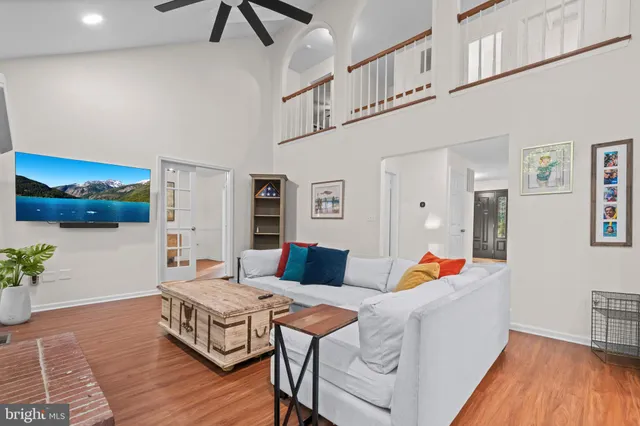 a bed room with a bed and a lamp