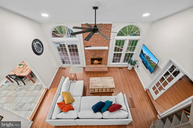 a kitchen with stainless steel appliances granite countertop a refrigerator sink and cabinets