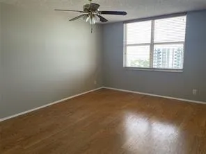 an empty room with closet area