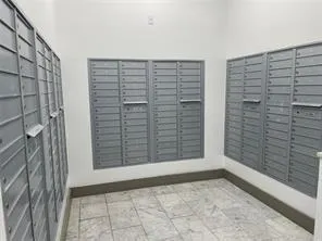 a room with lots of gym equipment