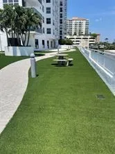a view of a swimming pool with a lounge chairs