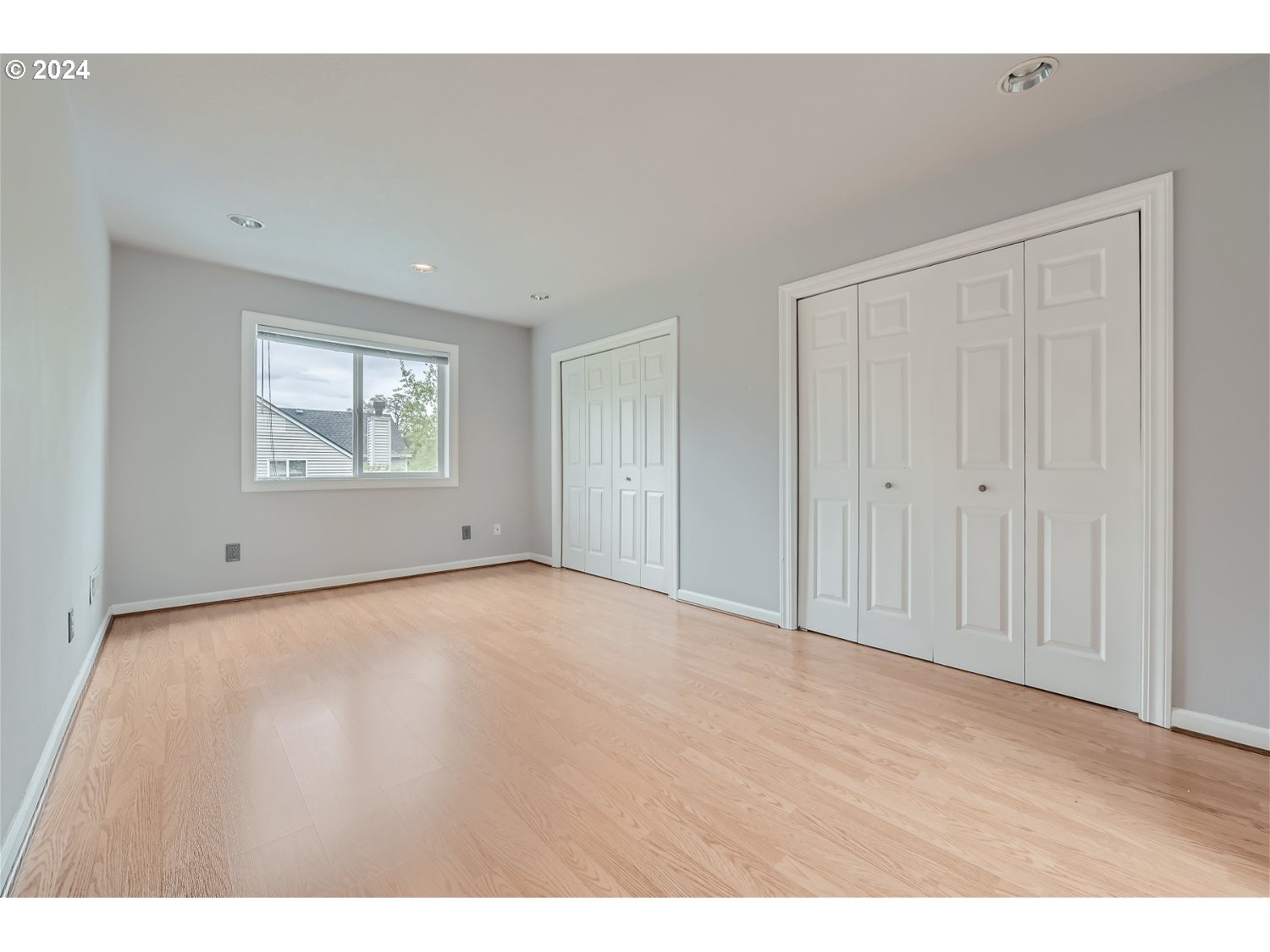 58916 Evergreen Loop St. Helens, OR 97051 - Photo 21 of 28 a view of an empty room with wooden floor and a window