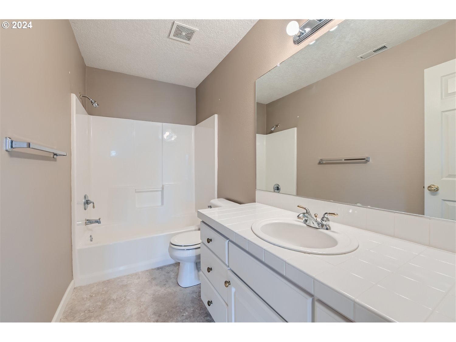 58916 Evergreen Loop St. Helens, OR 97051 - Photo 24 of 28 a bathroom with a sink toilet and shower
