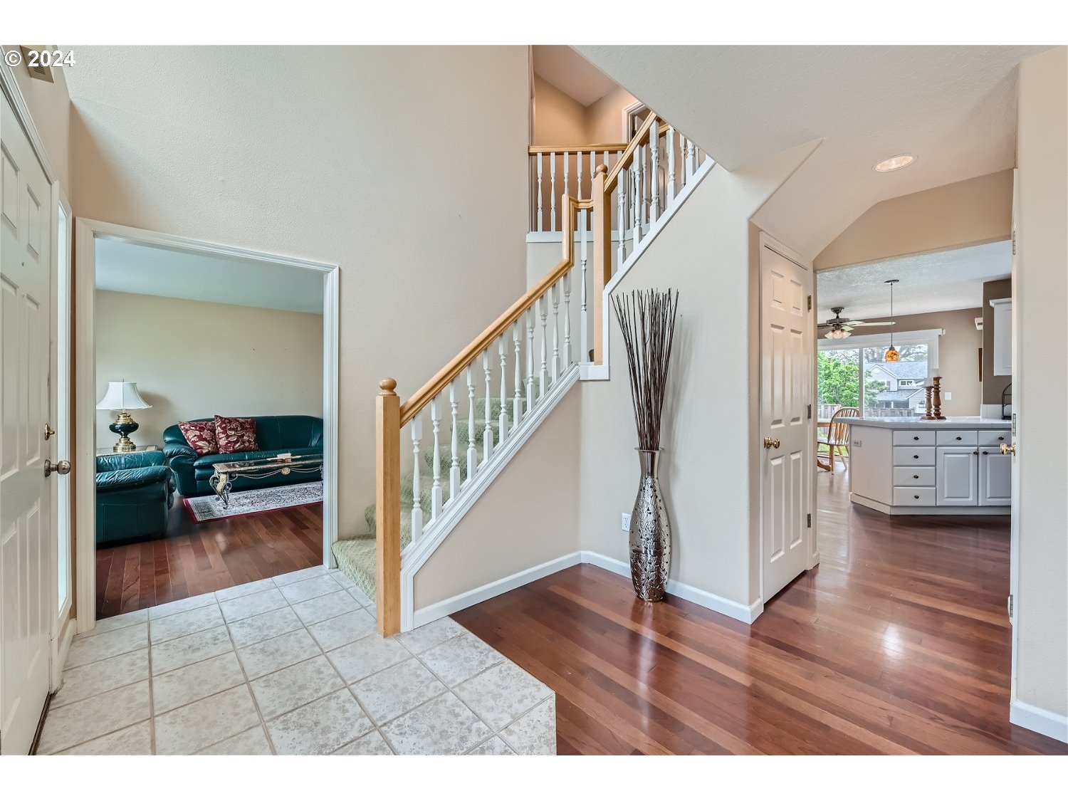 58916 Evergreen Loop St. Helens, OR 97051 - Photo 4 of 28 a view of a hallway view with living room and wooden floor