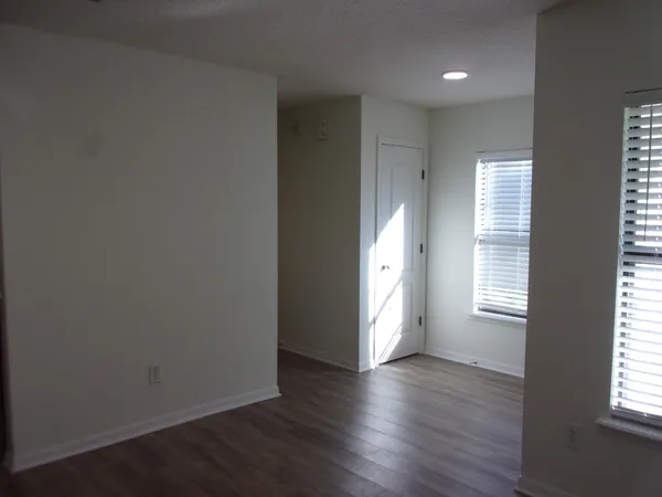 a kitchen with a stove and a microwave