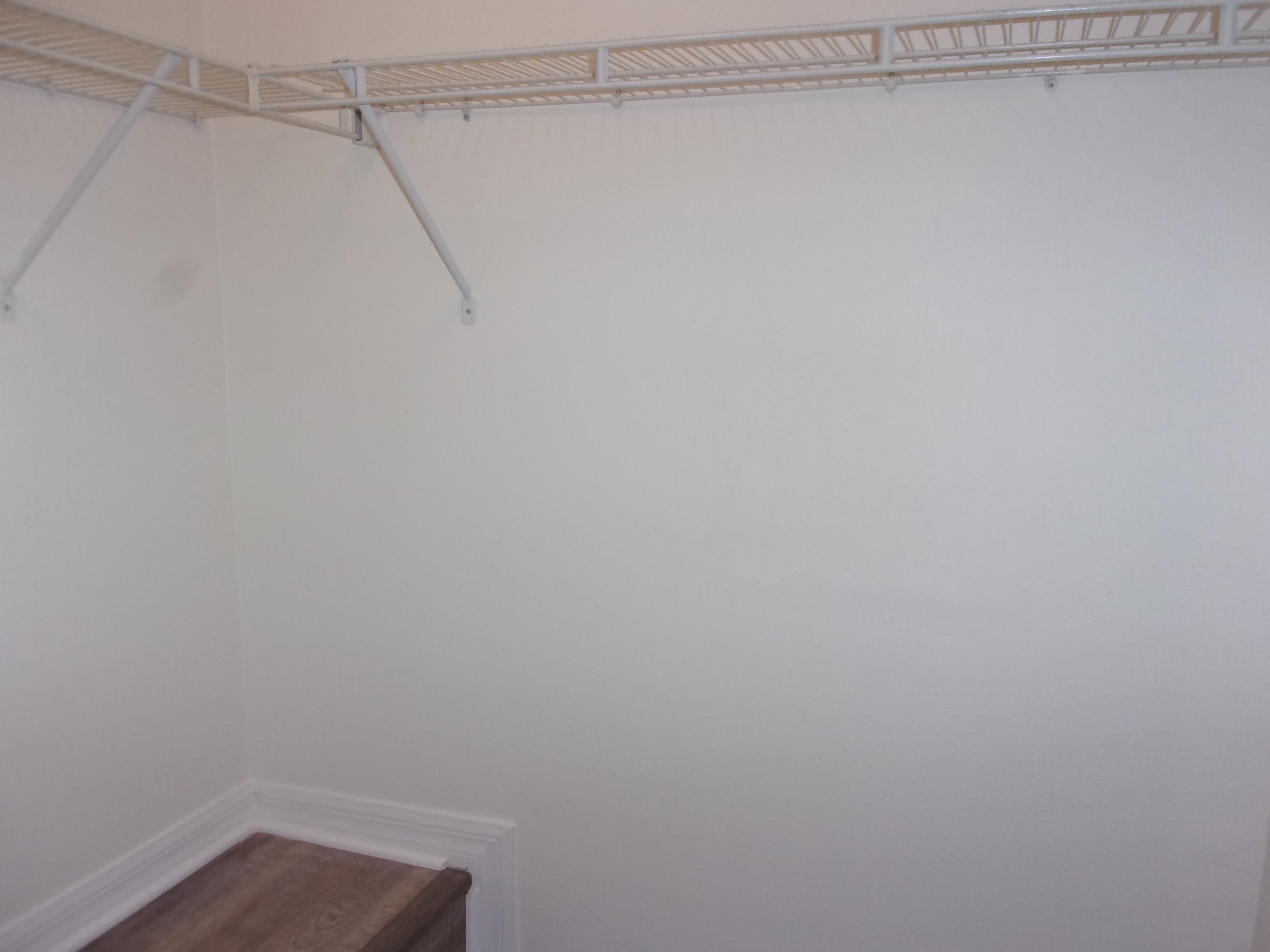 274 Syrah Way St. Augustine, FL 32084 - Photo 15 of 42 a view of a room with racks on the wall