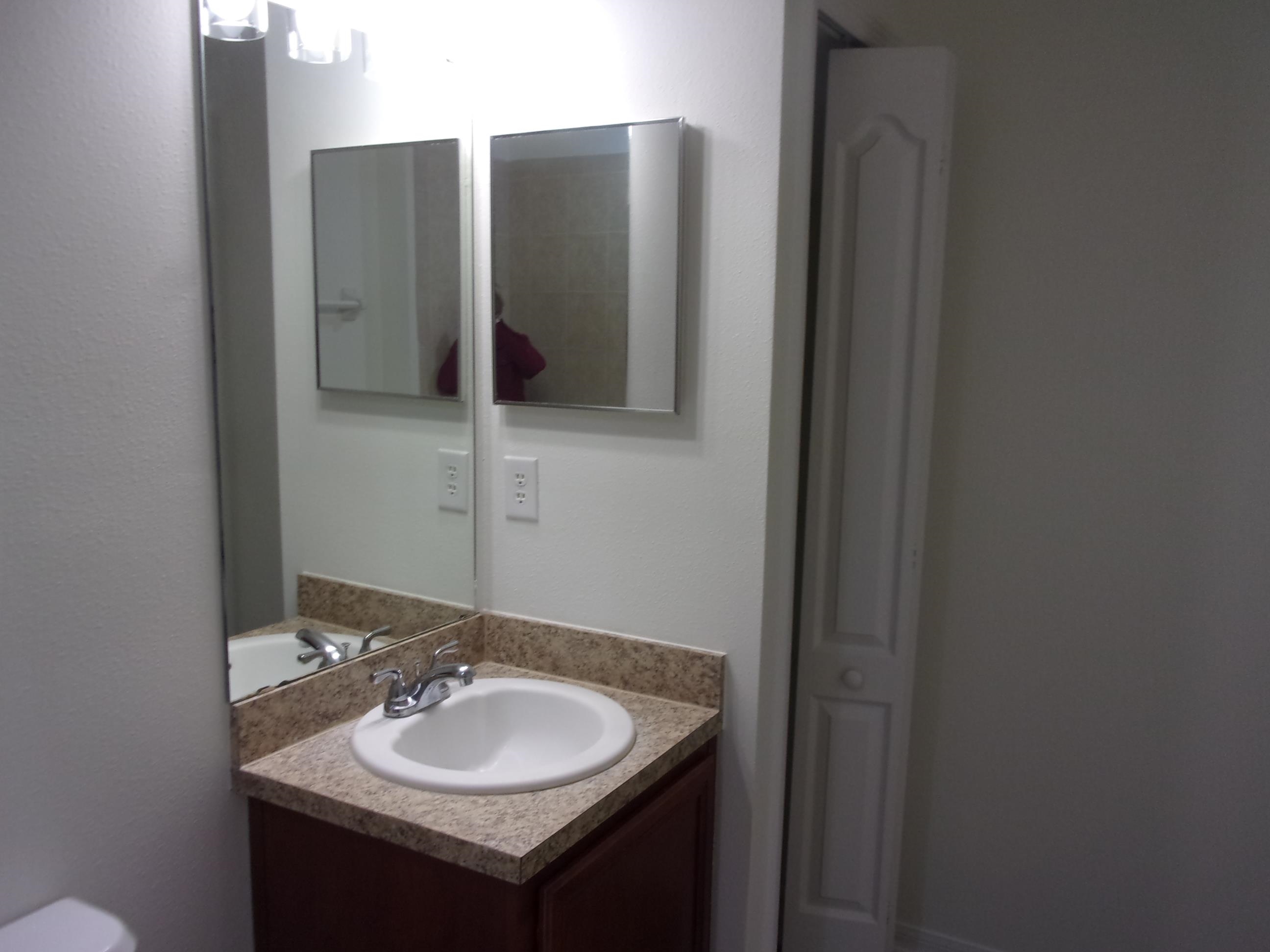 274 Syrah Way St. Augustine, FL 32084 - Photo 19 of 42 Bathroom featuring vanity and a closet