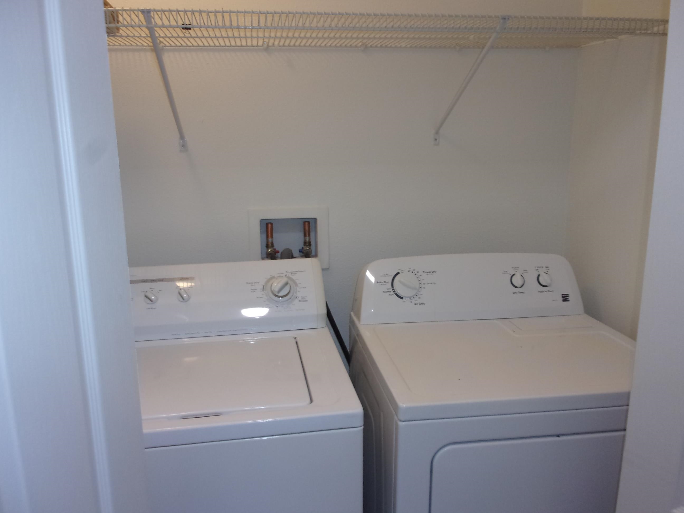 274 Syrah Way St. Augustine, FL 32084 - Photo 20 of 42 Laundry area with washer and clothes dryer