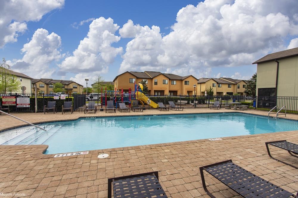 274 Syrah Way St. Augustine, FL 32084 - Photo 27 of 42 Community pool featuring a residential view and a patio area