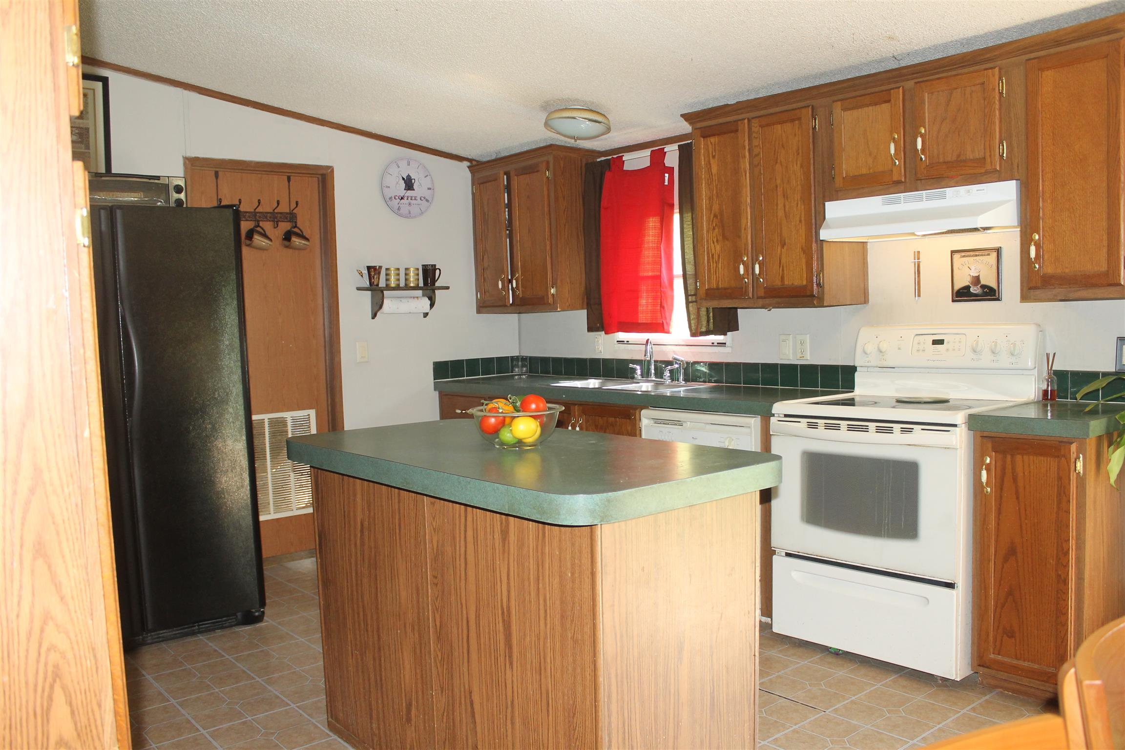 274 Big Ridge Road Indian Mound, TN 37079 - Photo 4 of 16 Oversized kitchen with work island. Appliances will remain.