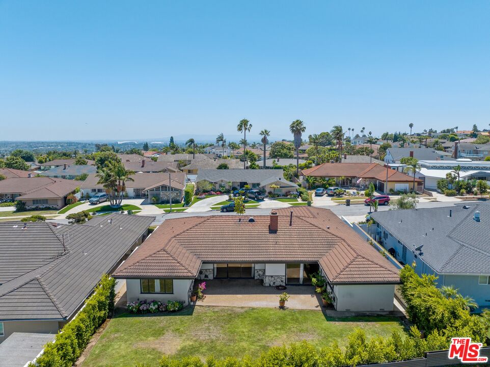 4245 Olympiad Drive View Park, CA 90043 - Photo 23 of 24 an aerial view of a house with a yard garage and lake view