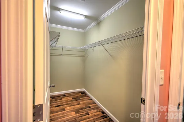 a bathroom with a tub and shower