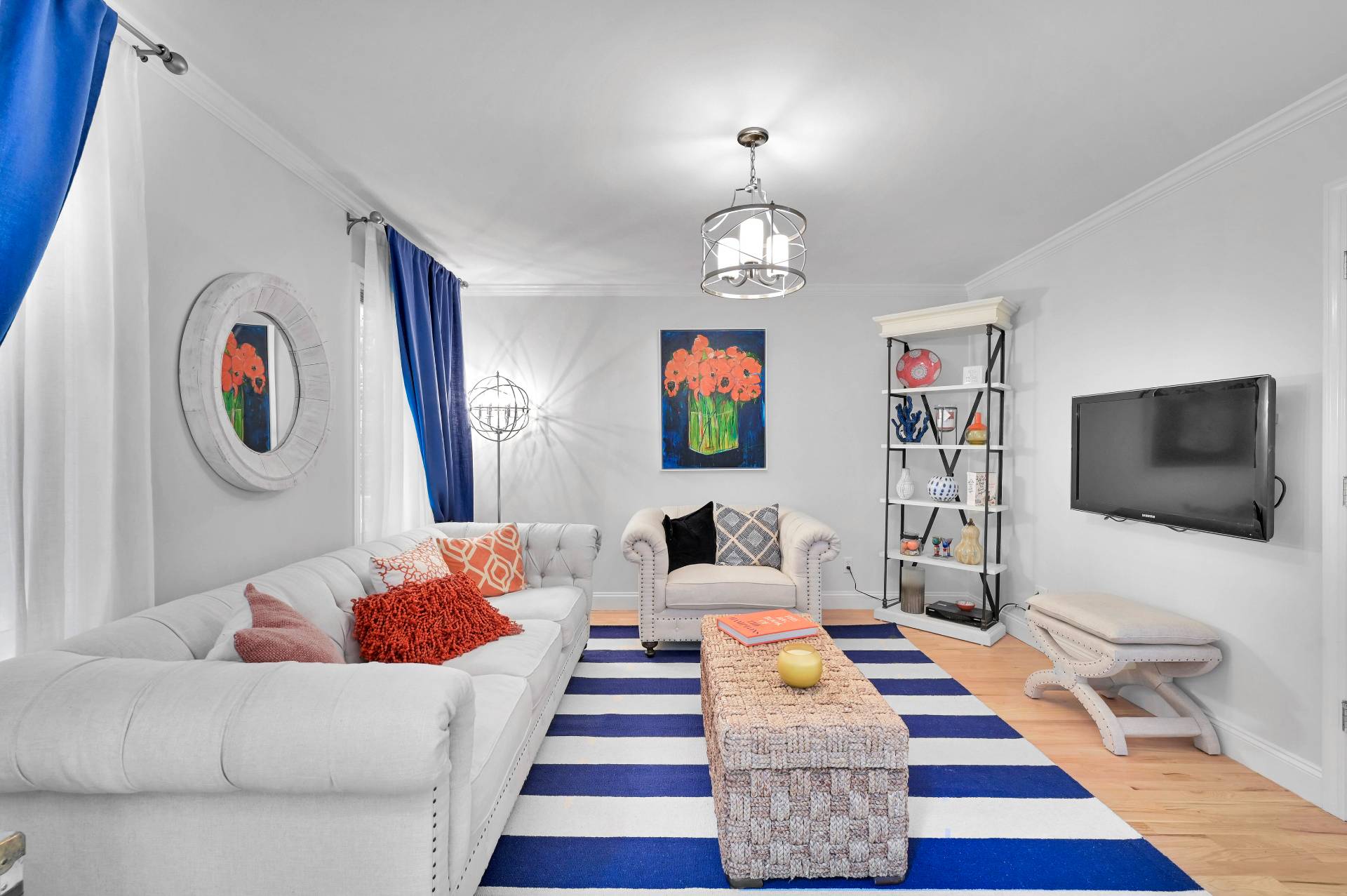 105 Northside Drive Sag Harbor, NY 11963 - Photo 15 of 33 a living room with furniture and a flat screen tv