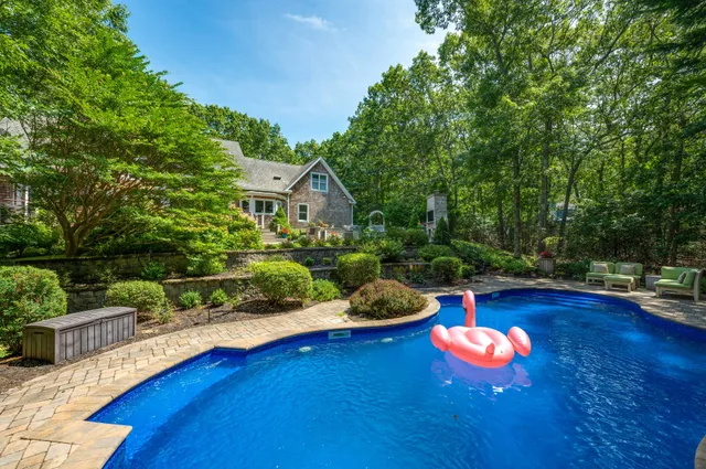 a view of a house with a swimming pool