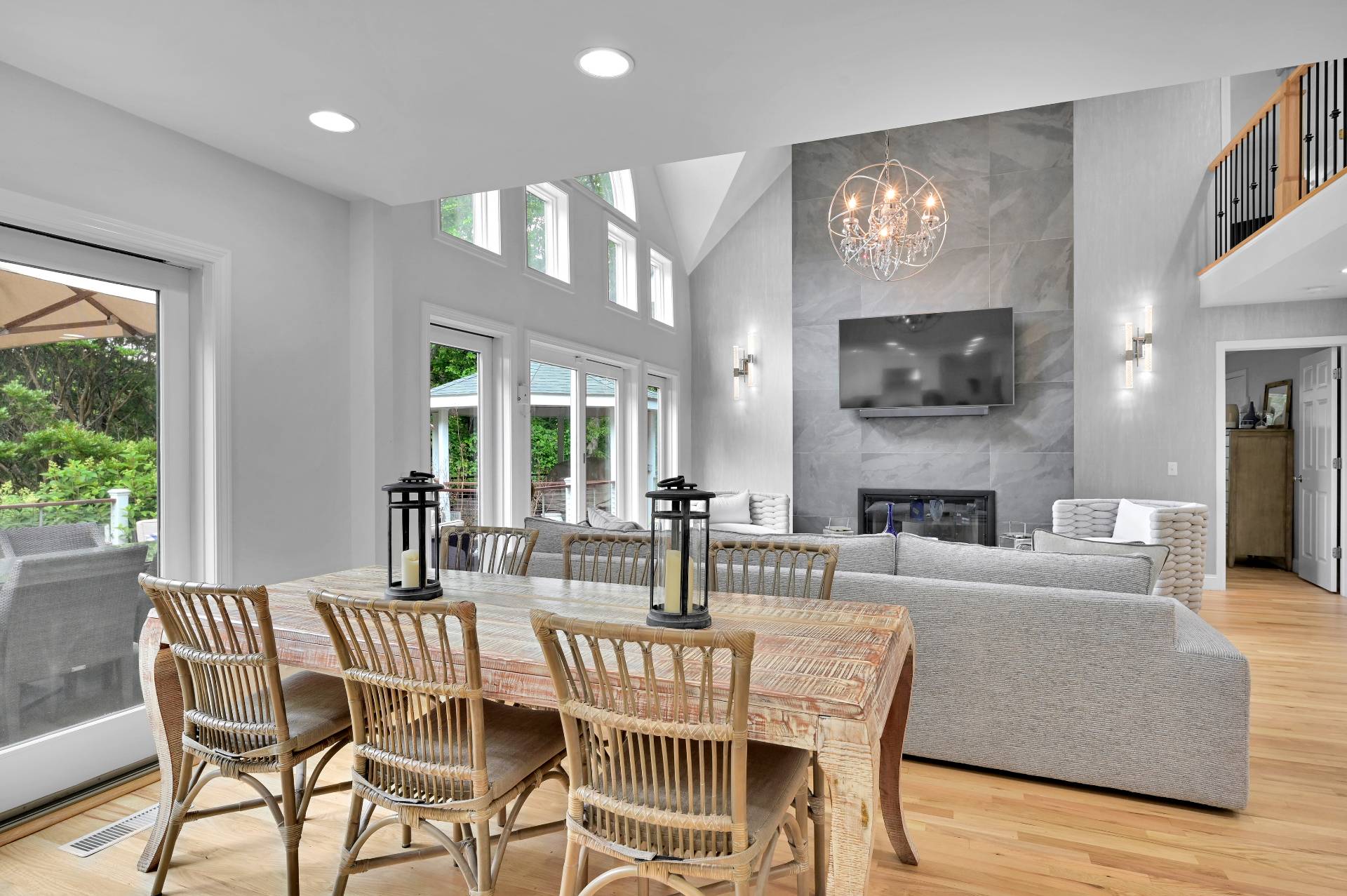 105 Northside Drive Sag Harbor, NY 11963 - Photo 10 of 33 a view of a dining room with furniture a fireplace and wooden floor