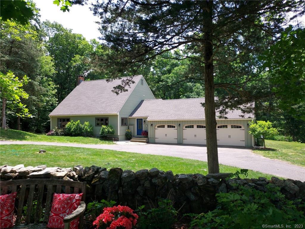 a view of a house with a garden