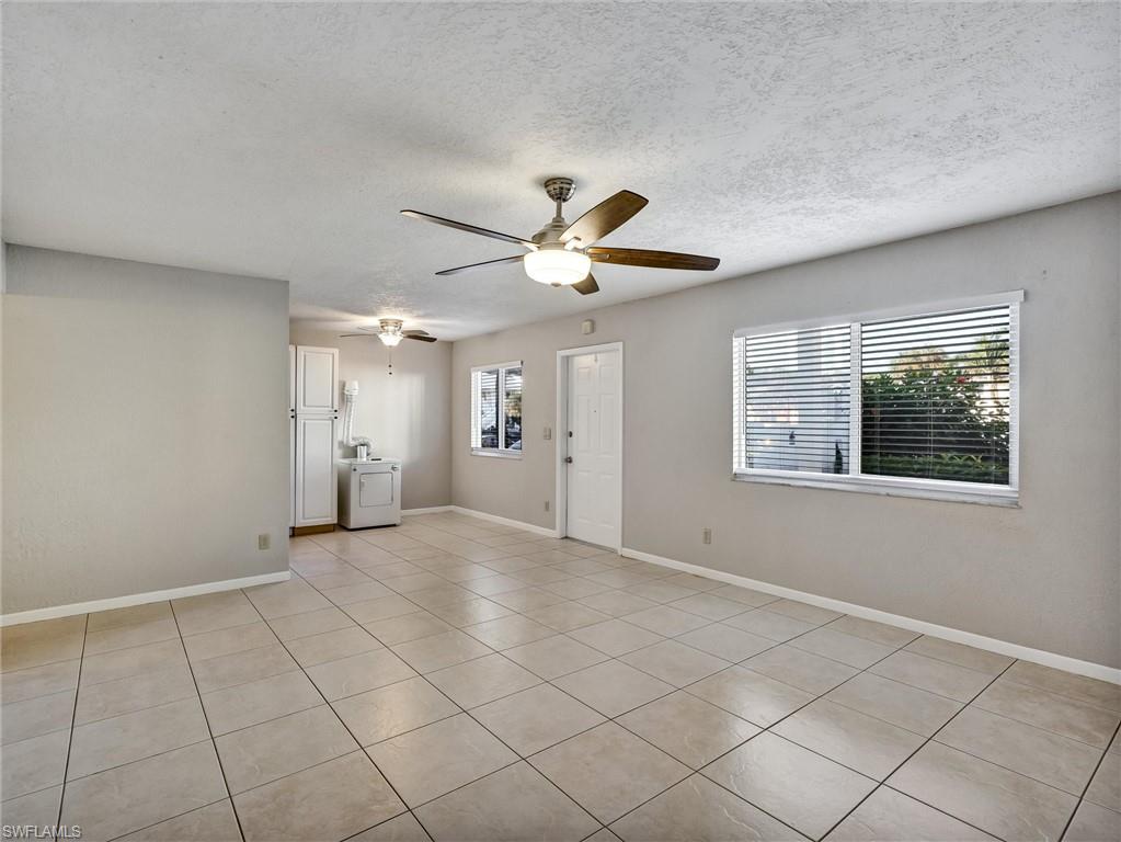 4621 Bayshore Drive, Unit Q1 Naples, FL 34112 - Photo 8 of 25 a view of an empty room with a window