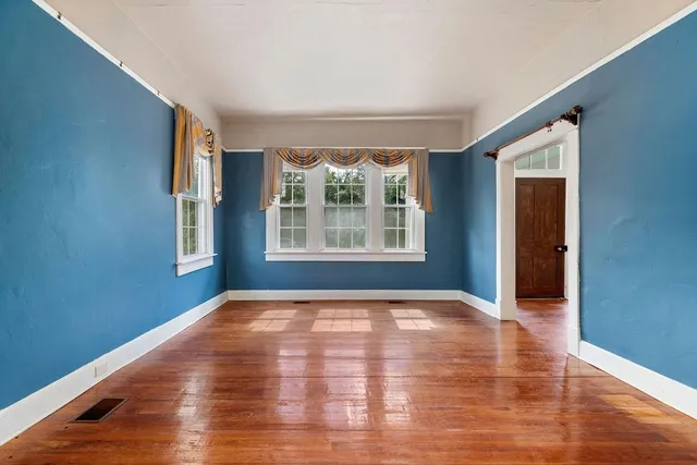 an empty room with windows