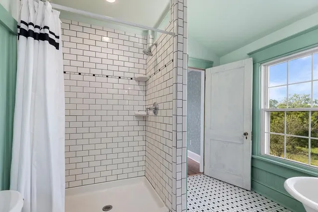 a swimming pool with some trees in the background