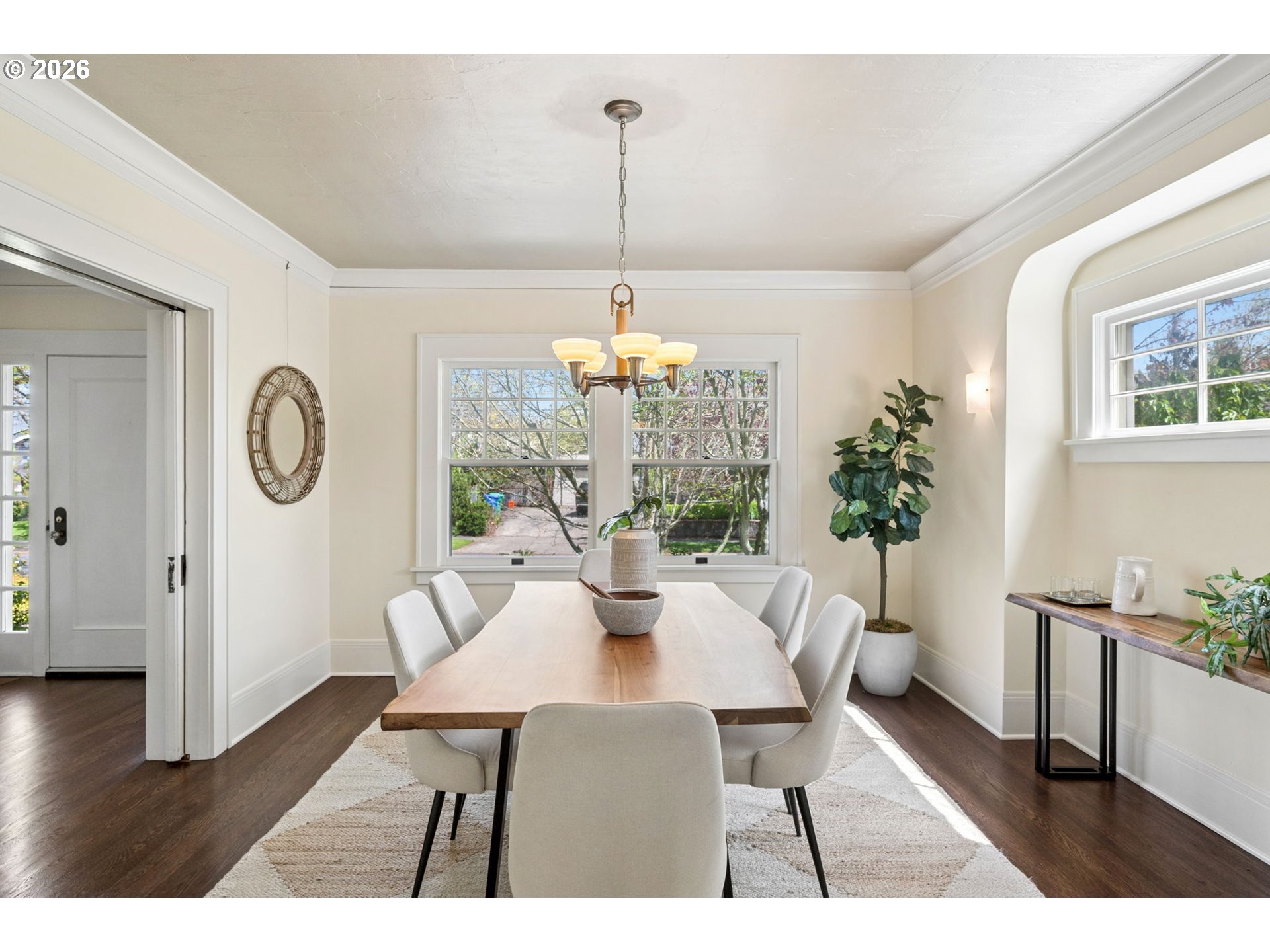 3434 Northeast Peerless Place Portland, OR 97232 - Photo 12 of 40 a view of a dining room with furniture window and wooden floor
