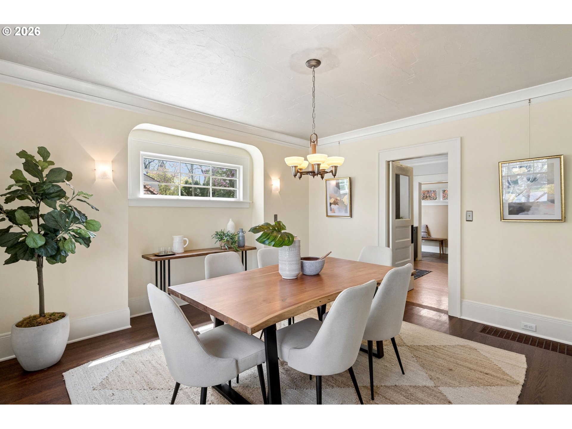 3434 Northeast Peerless Place Portland, OR 97232 - Photo 13 of 40 a view of a dining room with furniture and wooden floor
