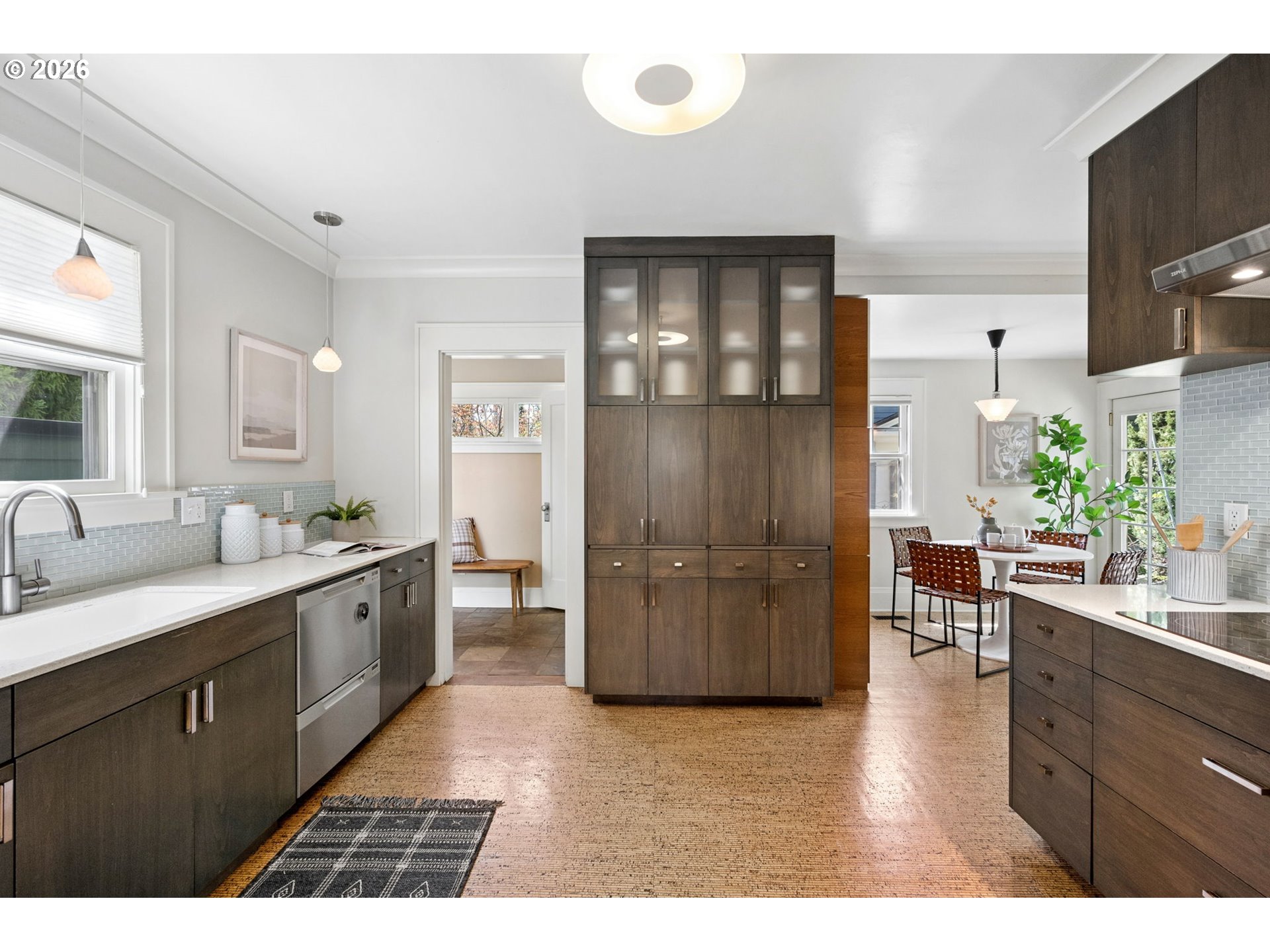3434 Northeast Peerless Place Portland, OR 97232 - Photo 14 of 40 a kitchen with a refrigerator and a sink
