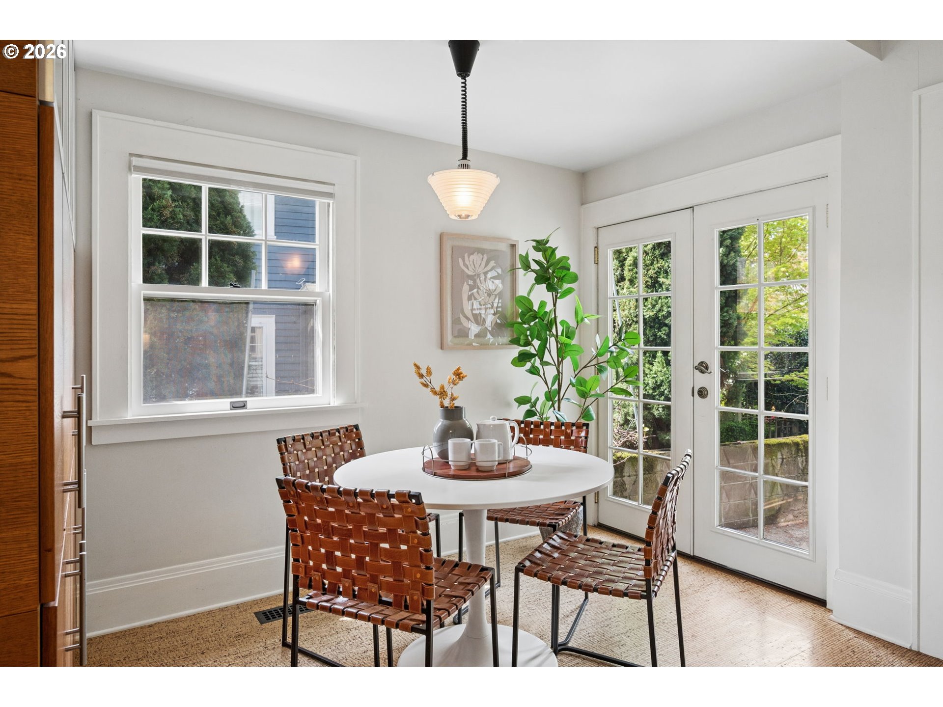 3434 Northeast Peerless Place Portland, OR 97232 - Photo 18 of 40 a dining room with furniture window and outside view