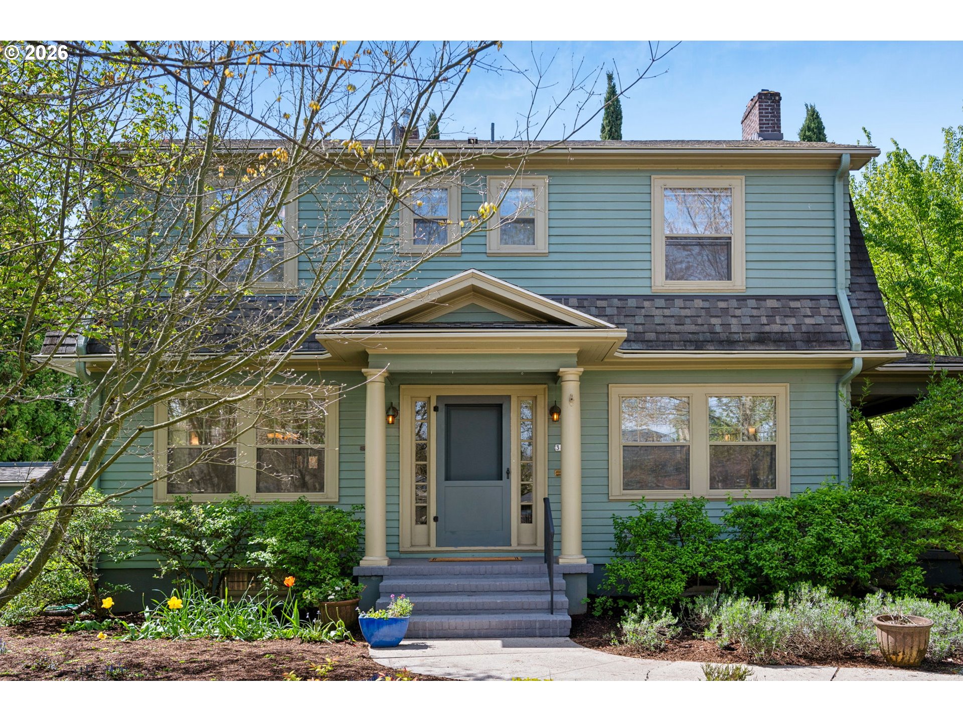 3434 Northeast Peerless Place Portland, OR 97232 - Photo 2 of 40 a front view of a house with garden